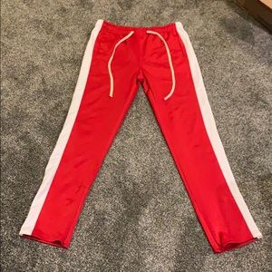 Red men’s track pants XL fits like Large